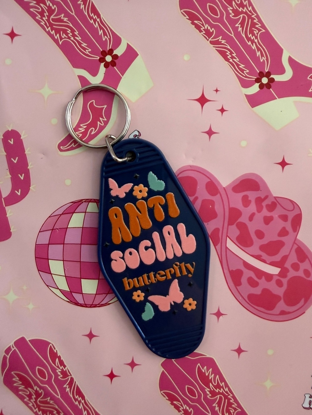 Anti Social Butterfly Blue Keychain with Colorful Lettering and Butterfly Design